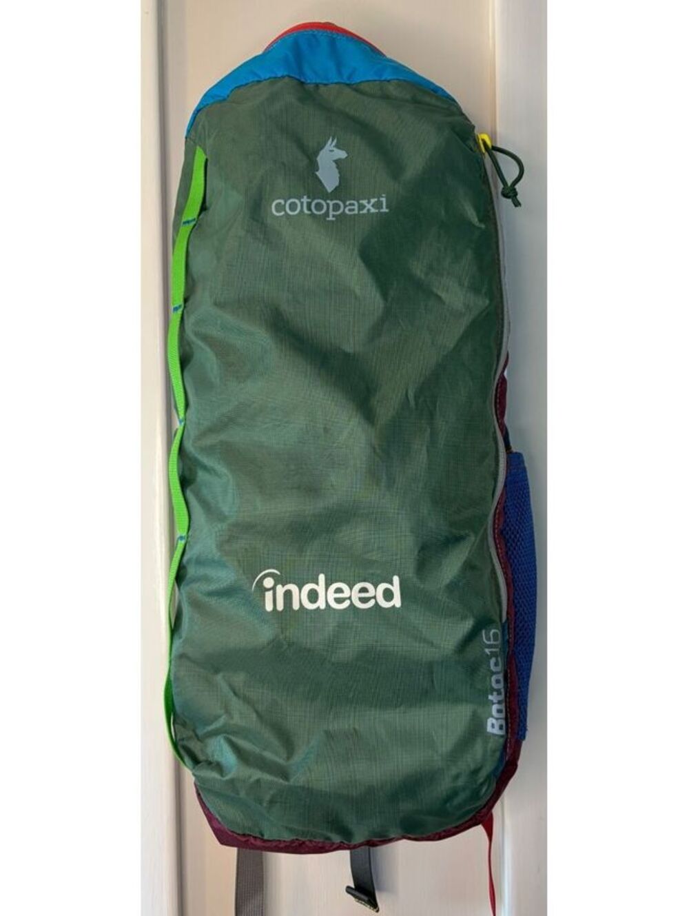 Cotopaxi Batac 16 backpack multicolor with Indeed logo - 16L